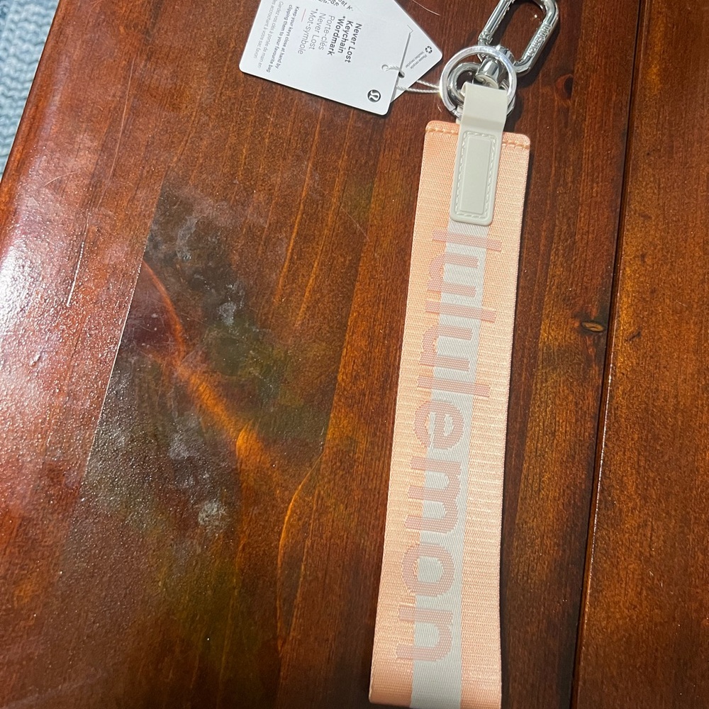 Lululemon Athletica Never Lost Peach and Cream Keychain